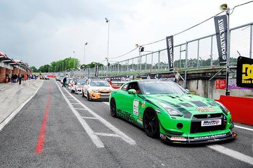 Lining up in the pit lane... Some serious bhp here!! Lining up in the pit lane... Some serious bhp here!!